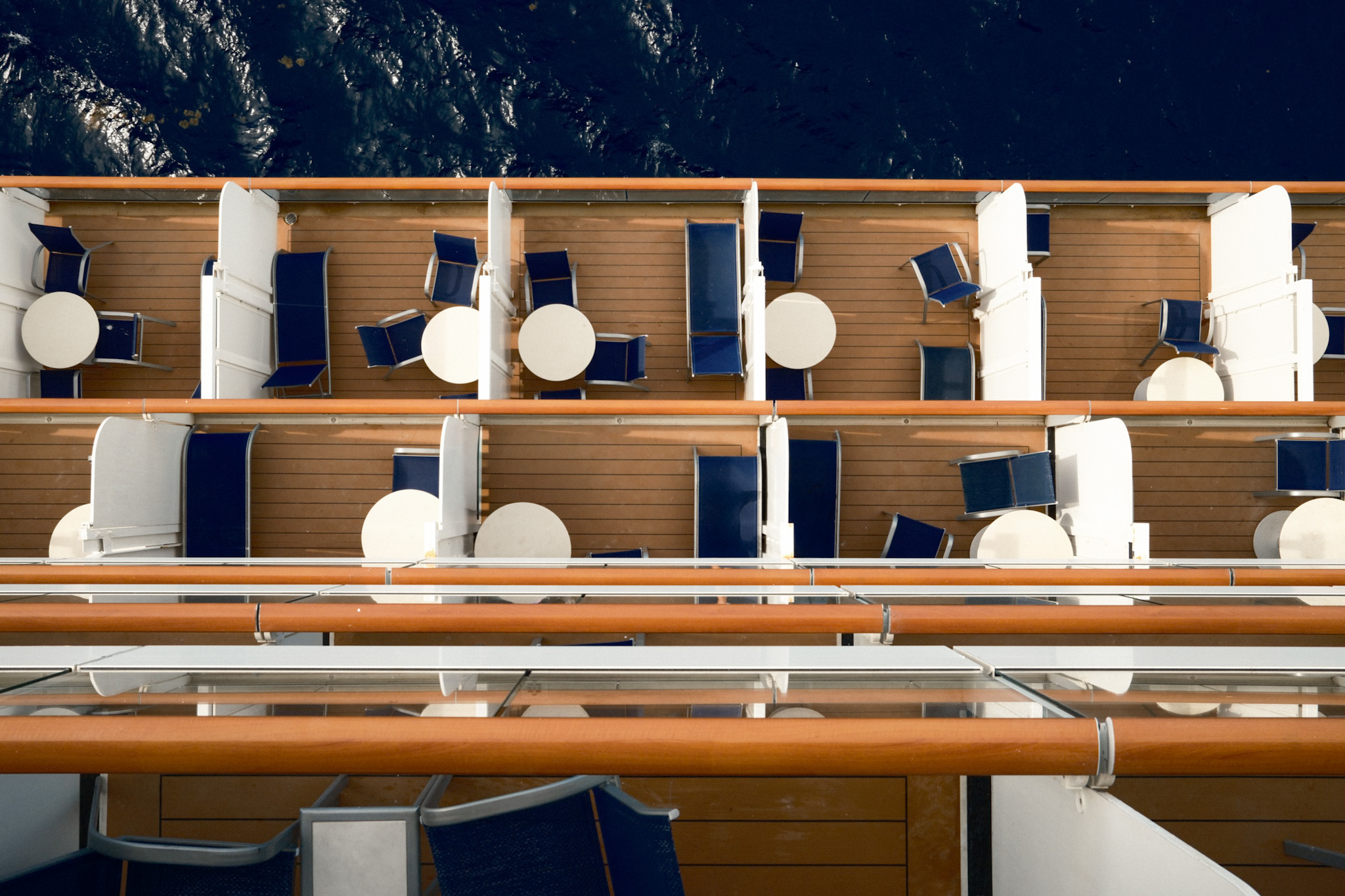 Editorial pattern of cruise ship deck balconies — precise, organized, at scale