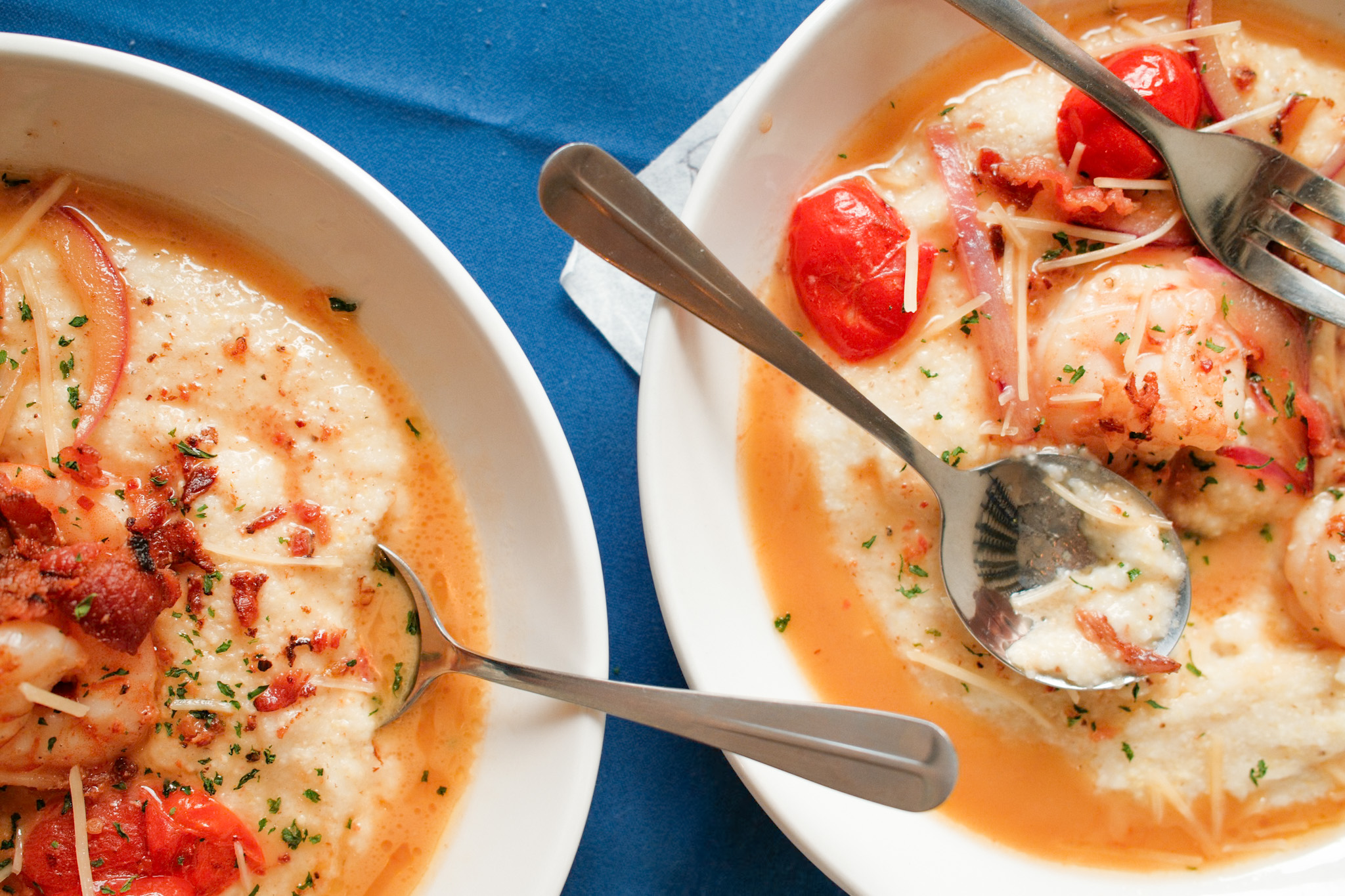 Overhead editorial shot of shrimp and grits — feed-worthy client content